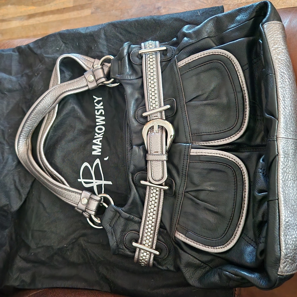 B. Makowsky Silver and Black Leather Bag with Sleek Design